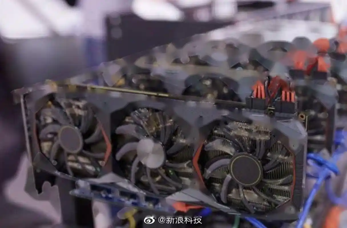 Close-up of ASIC miner chips with custom firmware interface displayed.