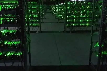 Picture illustrating a modern mining farm with rows of ASICs and advanced cooling systems